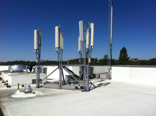Installing a telecommunication tower on the roof